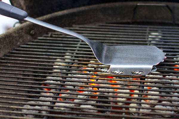 Grill-Brush-on-a-Charcoal-Grill